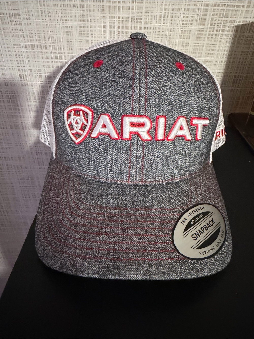 Ariat White and Gray Mesh Trucker Cap with Red Eyelets